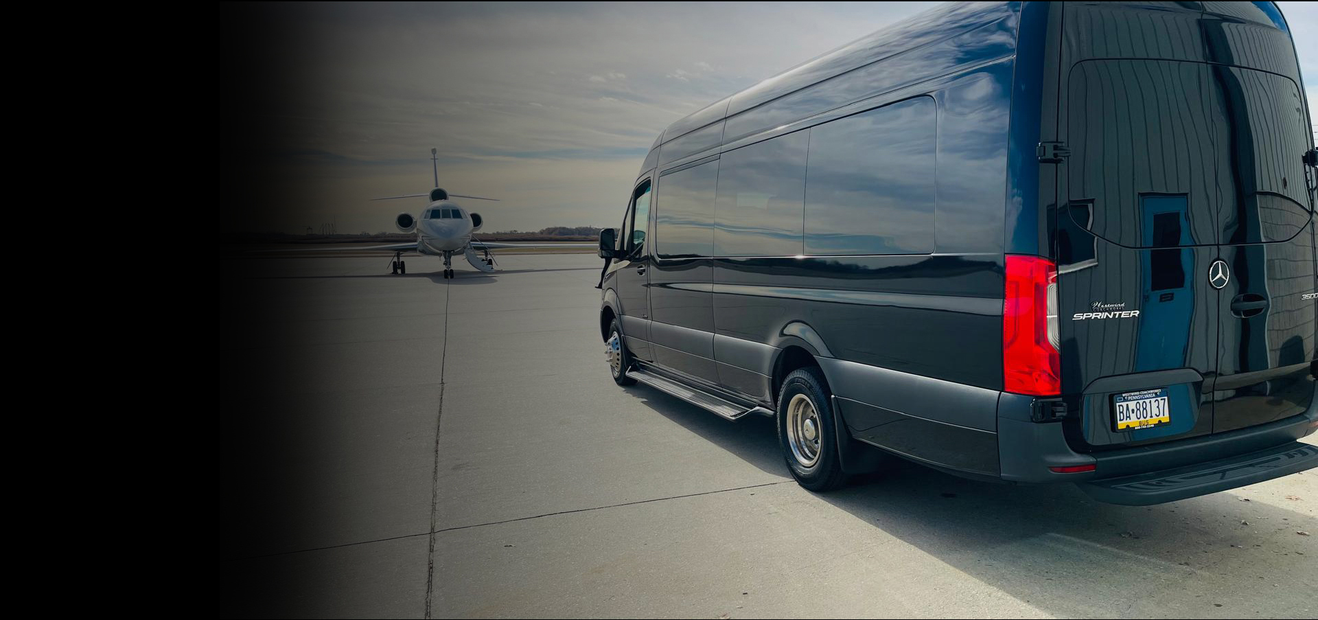The Royal Limousine Mercedes-Benz Sprinter waiting beside a private jet on the tarmac